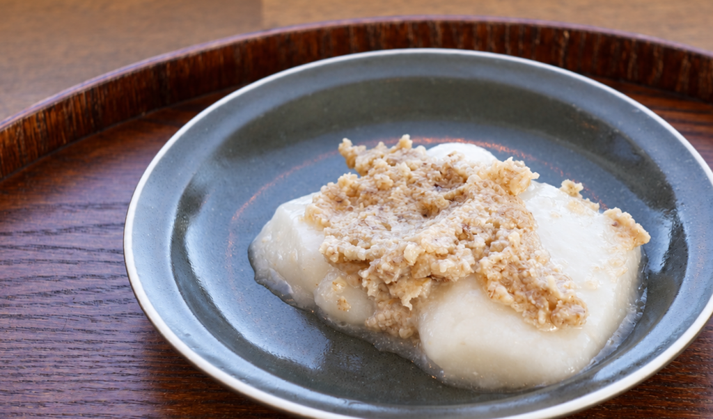 Kurumi-dare mochi topped with sweet and savory walnut sauce at Mochigoya Mam in Kamikawa, Hokkaido